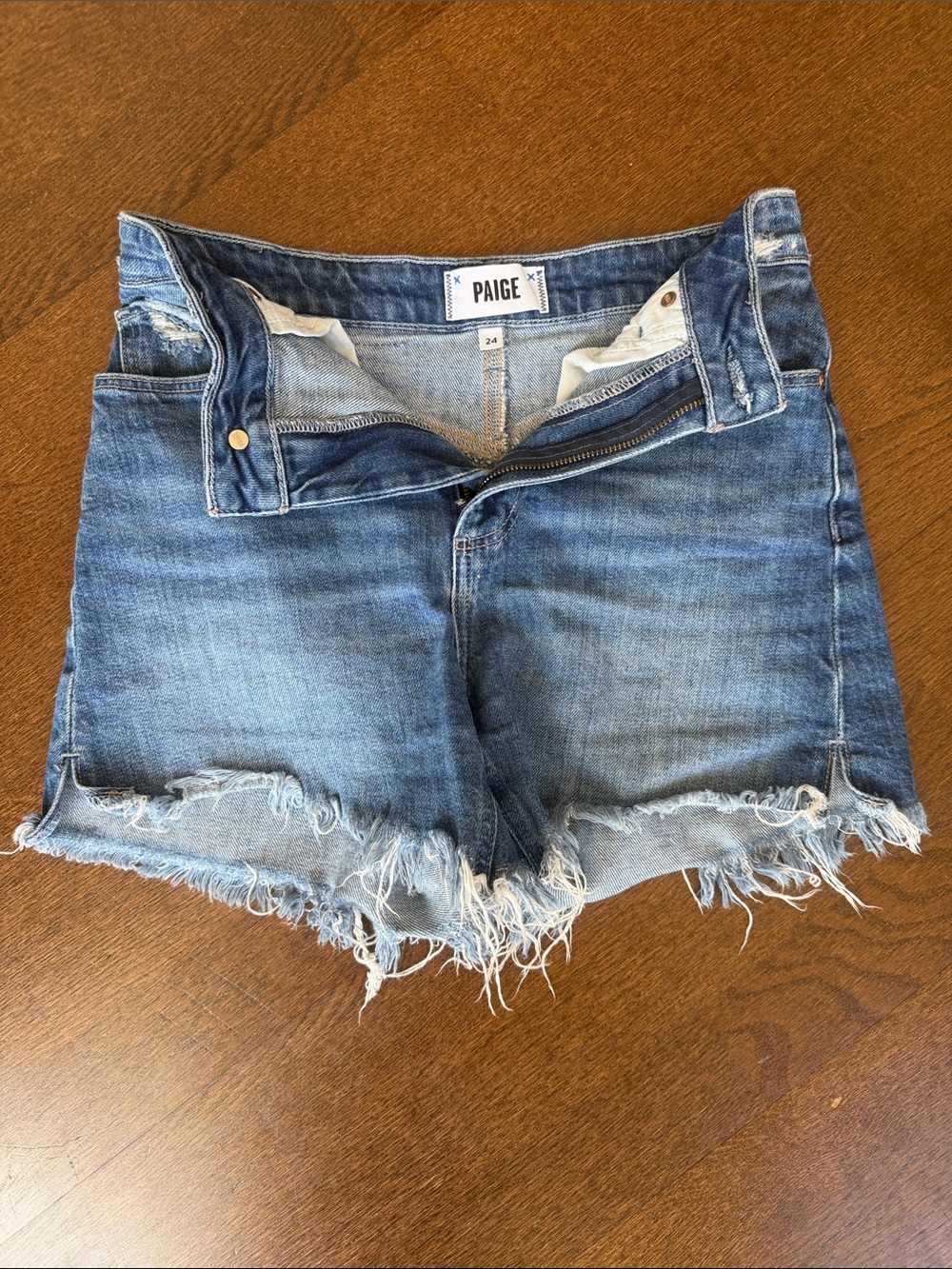 PAIGE Frayed Hem Denim Cutoff Shorts - Medium Blue